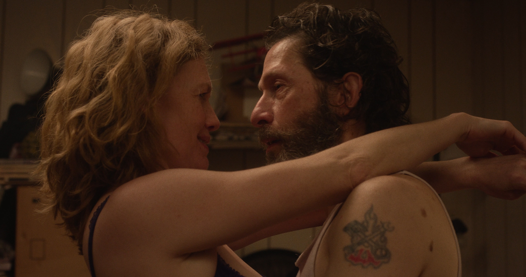 Tim Blake Nelson, Mirelle Enos embrace